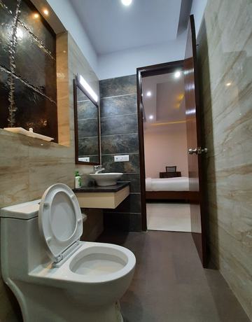 Imagen de la habitación del Hotel Shacon Suites. Foto 16