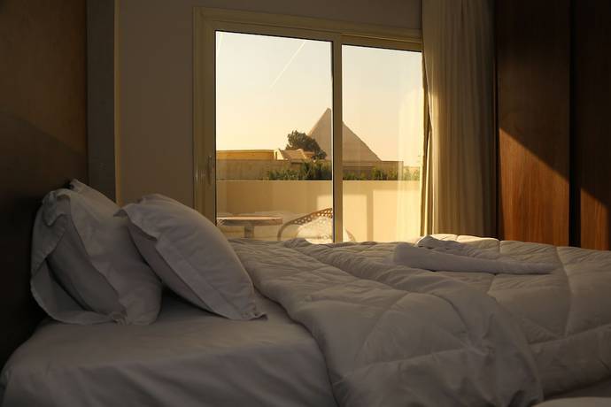 Imagen de la habitación del Hotel Shadow Pyramids View INN. Foto 14