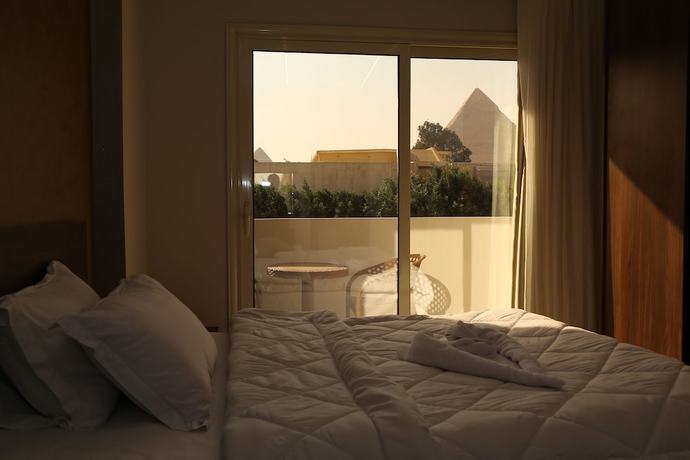 Imagen de la habitación del Hotel Shadow Pyramids View INN. Foto 15