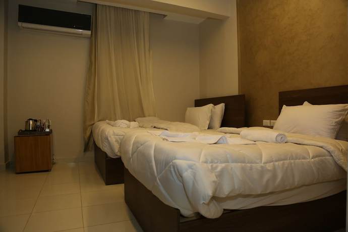 Imagen de la habitación del Hotel Shadow Pyramids View INN. Foto 16