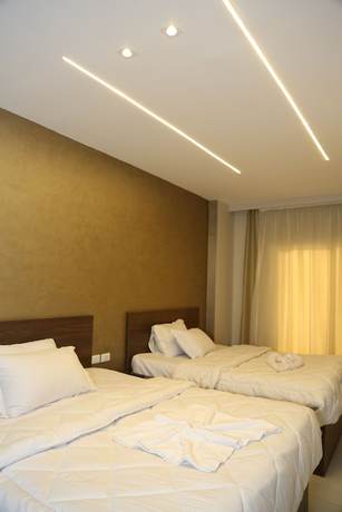 Imagen de la habitación del Hotel Shadow Pyramids View INN. Foto 19