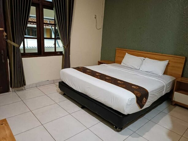 Imagen de la habitación del Hotel Shafira Yogyakarta. Foto 14