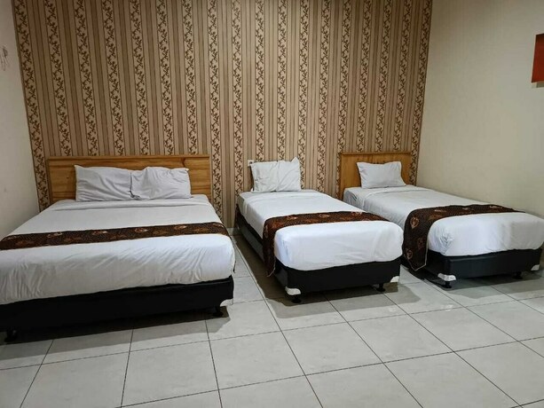 Imagen de la habitación del Hotel Shafira Yogyakarta. Foto 19