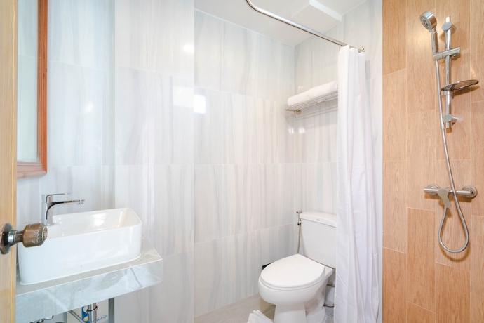 Imagen de la habitación del Hotel Shagwell Mansions Pattaya. Foto 10