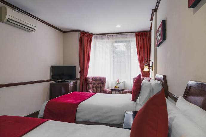 Imagen de la habitación del Hotel Shah's Village Hotel. Foto 11