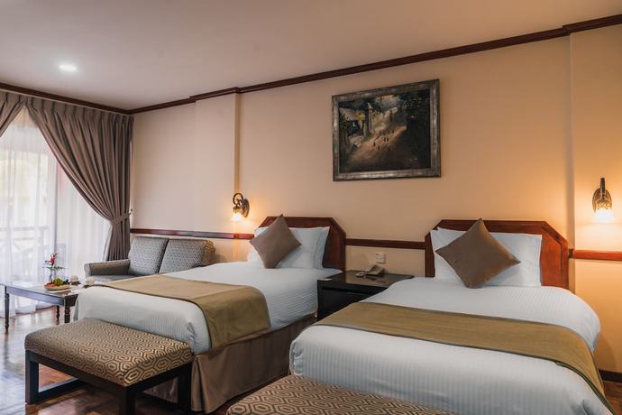 Imagen de la habitación del Hotel Shah's Village Hotel. Foto 14
