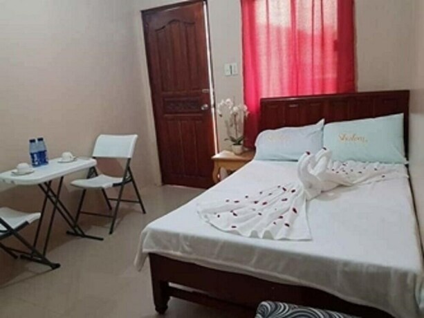 Imagen de la habitación del Hotel Shalom Guest House And Resto Bar. Foto 15