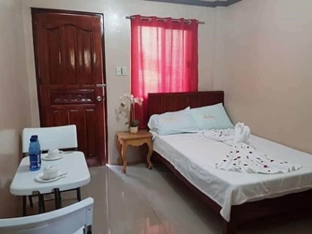 Imagen de la habitación del Hotel Shalom Guest House And Resto Bar. Foto 20