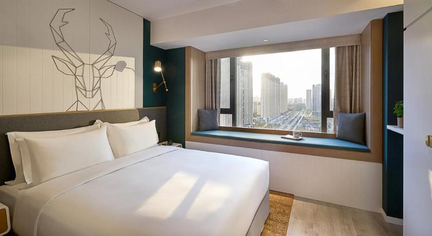 Imagen de la habitación del Hotel Shama Hub New City Changchun. Foto 2