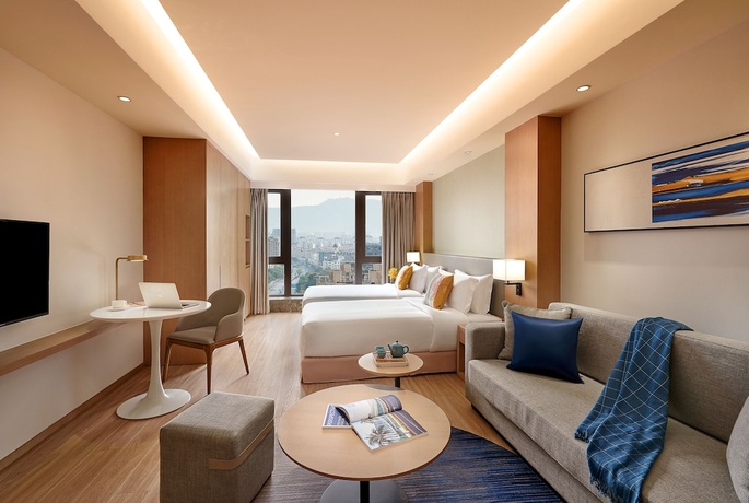 Imagen de la habitación del Hotel Shama Serviced Apartments Zijingang Hangzhou. Foto 4