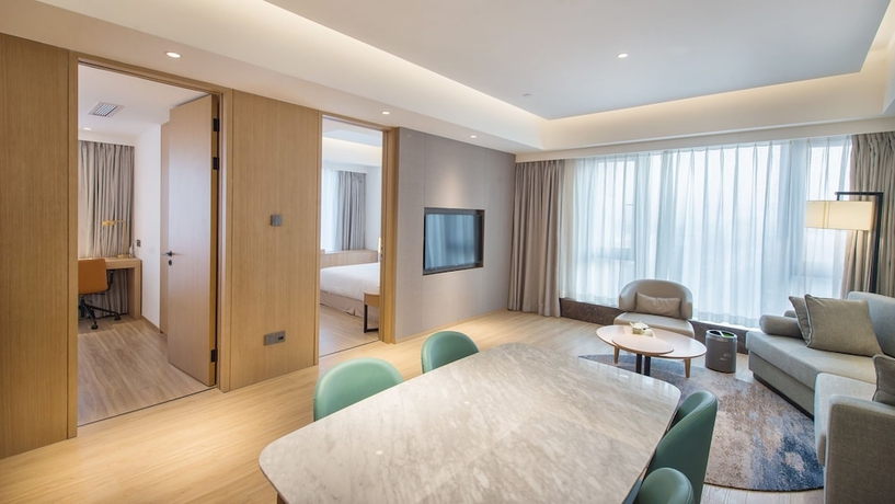 Imagen de la habitación del Hotel Shama Serviced Apartments Zijingang Hangzhou. Foto 10