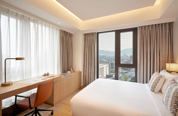 Imagen de la habitación del Hotel Shama Serviced Apartments Zijingang Hangzhou. Foto 11