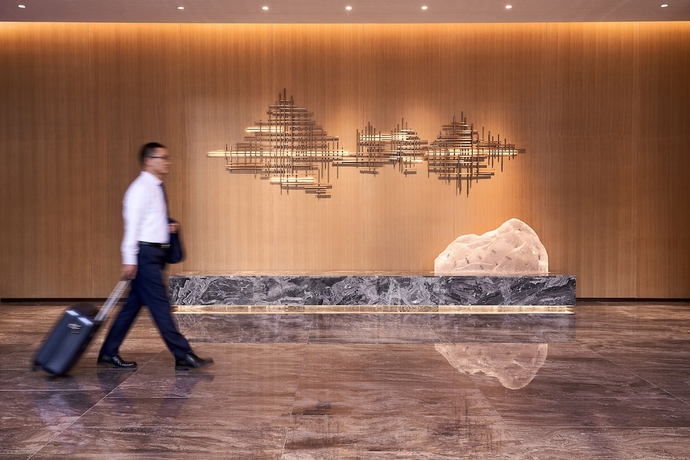 Imagen de los interiores del Hotel Shama Serviced Apartments Zijingang Hangzhou. Foto 18