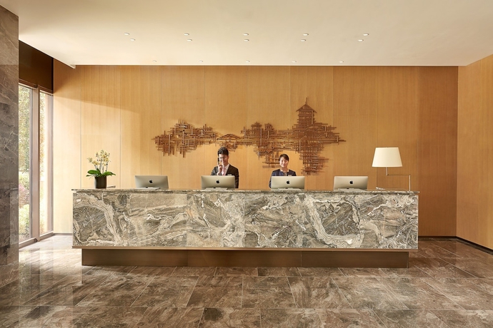 Imagen de los interiores del Hotel Shama Serviced Apartments Zijingang Hangzhou. Foto 19