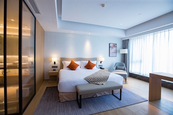 Imagen de la habitación del Hotel Shama Serviced Apartments Zijingang Hangzhou. Foto 12