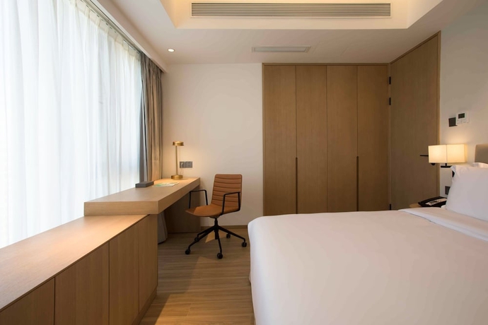 Imagen de la habitación del Hotel Shama Serviced Apartments Zijingang Hangzhou. Foto 13
