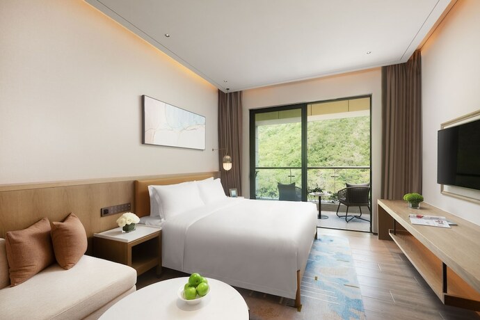Imagen de la habitación del Hotel Shama Yalong Bay Sanya. Foto 15
