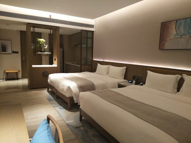 Imagen de la habitación del Hotel Shama Yalong Bay Sanya. Foto 17