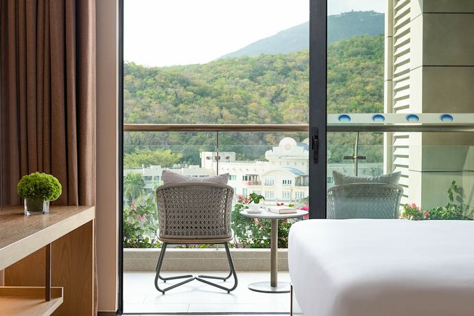 Imagen de la habitación del Hotel Shama Yalong Bay Sanya. Foto 18