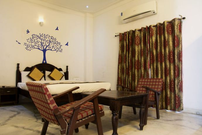Imagen de la habitación del Hotel Shambhu Villas. Foto 4