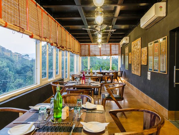 Imagen del bar/restaurante del Hotel Shambhu Villas. Foto 3