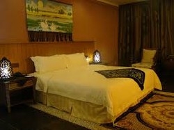 Imagen de la habitación del Hotel Shampoola Forest Hotel. Foto 3