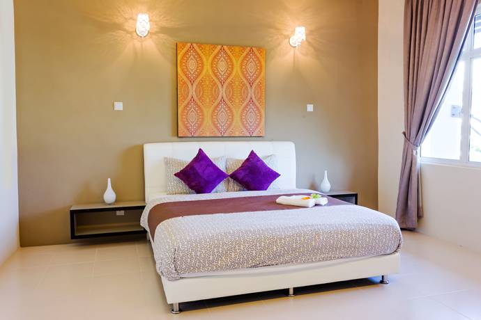 Imagen de la habitación del Hotel Shamrock Beach Villas 12. Foto 2