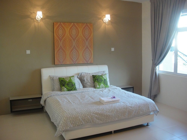 Imagen de la habitación del Hotel Shamrock Beach Villas. Foto 8