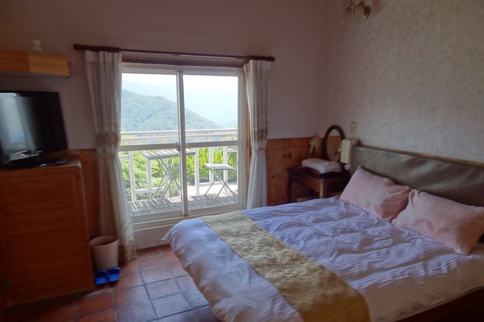 Imagen de la habitación del Hotel Shan Shui-Yuan Vege Guest House. Foto 8
