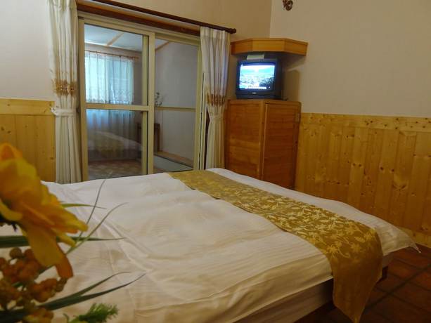 Imagen de la habitación del Hotel Shan Shui-Yuan Vege Guest House. Foto 18