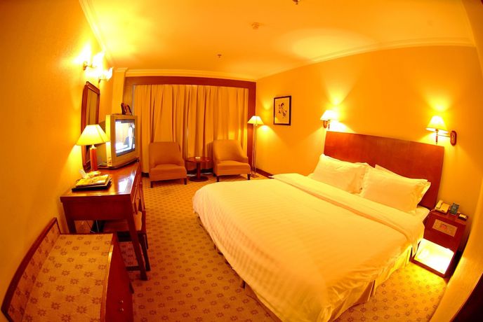 Imagen de la habitación del Hotel Shandong Pacific Hotel. Foto 4