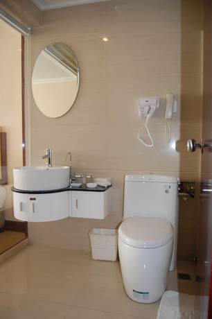 Imagen de la habitación del Hotel Shandong Pacific Hotel. Foto 5