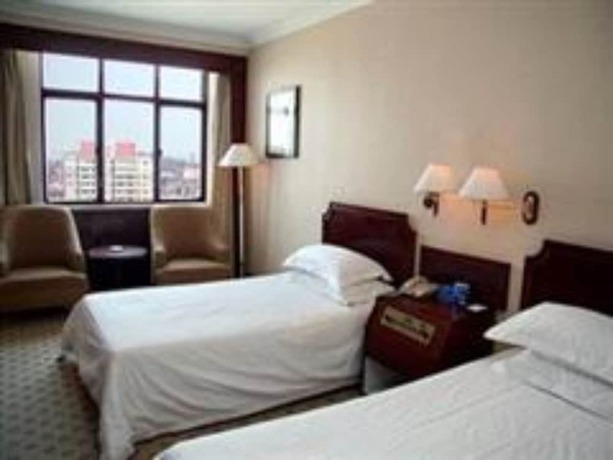 Imagen de la habitación del Hotel Shandong Pacific Hotel. Foto 8
