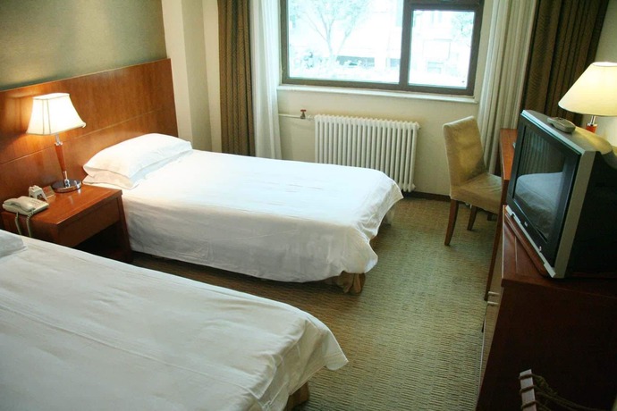 Imagen de la habitación del Hotel Shang Kang Cheng. Foto 4