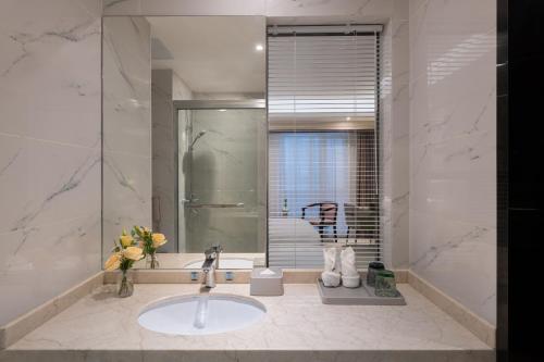 Imagen de la habitación del Hotel ShangHai LuAn Garden. Foto 14