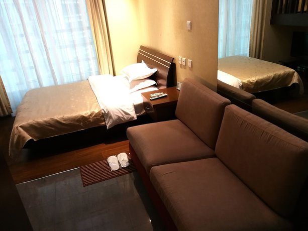 Imagen de la habitación del Hotel Shanghai Abest Xinshikong Apartments. Foto 2