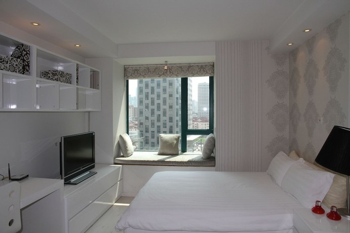 Imagen de la habitación del Hotel Shanghai Abest Xinshikong Apartments. Foto 6