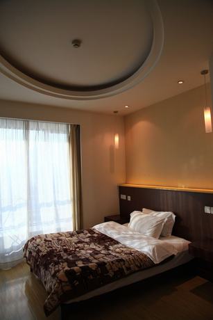 Imagen de la habitación del Hotel Shanghai Abest Xinshikong Apartments. Foto 8