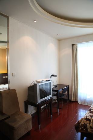 Imagen de la habitación del Hotel Shanghai Abest Xinshikong Apartments. Foto 19