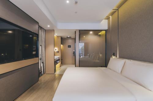Imagen de la habitación del Hotel Shanghai Atour On The Bund- People Square. Foto 15