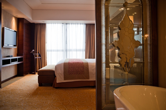 Imagen de la habitación del Hotel Shanghai Baixia Pagoda. Foto 11