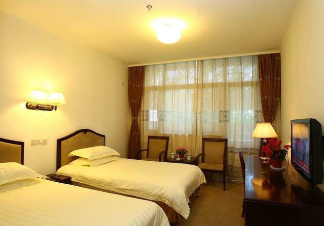 Imagen de la habitación del Hotel Shanghai Binjiang Entertainment Center. Foto 9