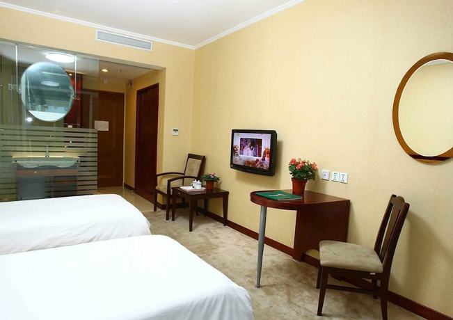 Imagen de la habitación del Hotel Shanghai Binjiang Entertainment Center. Foto 10