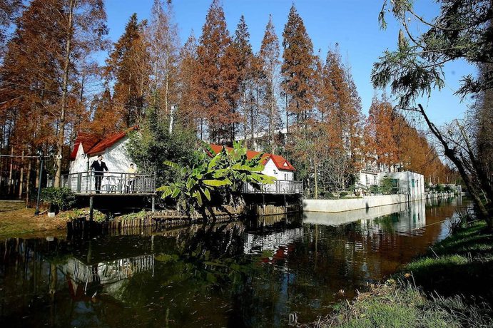 Imagen de la habitación del Hotel Shanghai Binjiang Entertainment Center. Foto 11