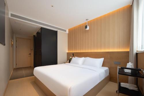 Imagen de la habitación del Hotel Shanghai Captain 5 Youth - Xinzhuang Metro Station. Foto 14