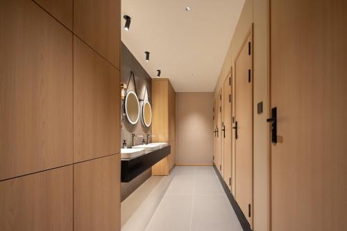 Imagen de la habitación del Hotel Shanghai Captain 5 Youth - Xinzhuang Metro Station. Foto 16