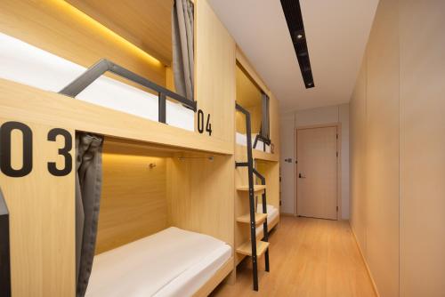 Imagen de la habitación del Hotel Shanghai Captain 5 Youth - Xinzhuang Metro Station. Foto 18