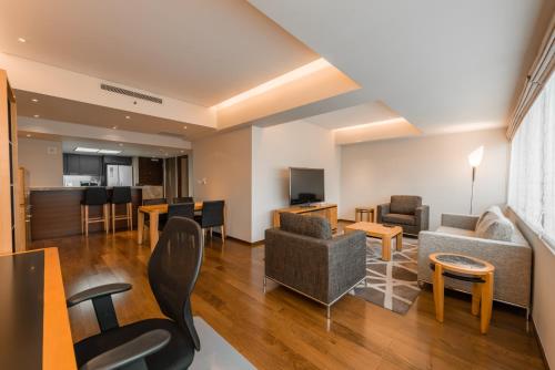 Imagen de la habitación del Hotel Shanghai Centre Serviced Apartment. Foto 7