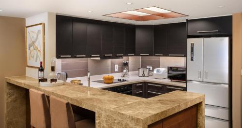 Imagen de la habitación del Hotel Shanghai Centre Serviced Apartment. Foto 8