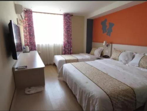 Imagen de la habitación del Hotel Shanghai Digong International Tourism Resort. Foto 7